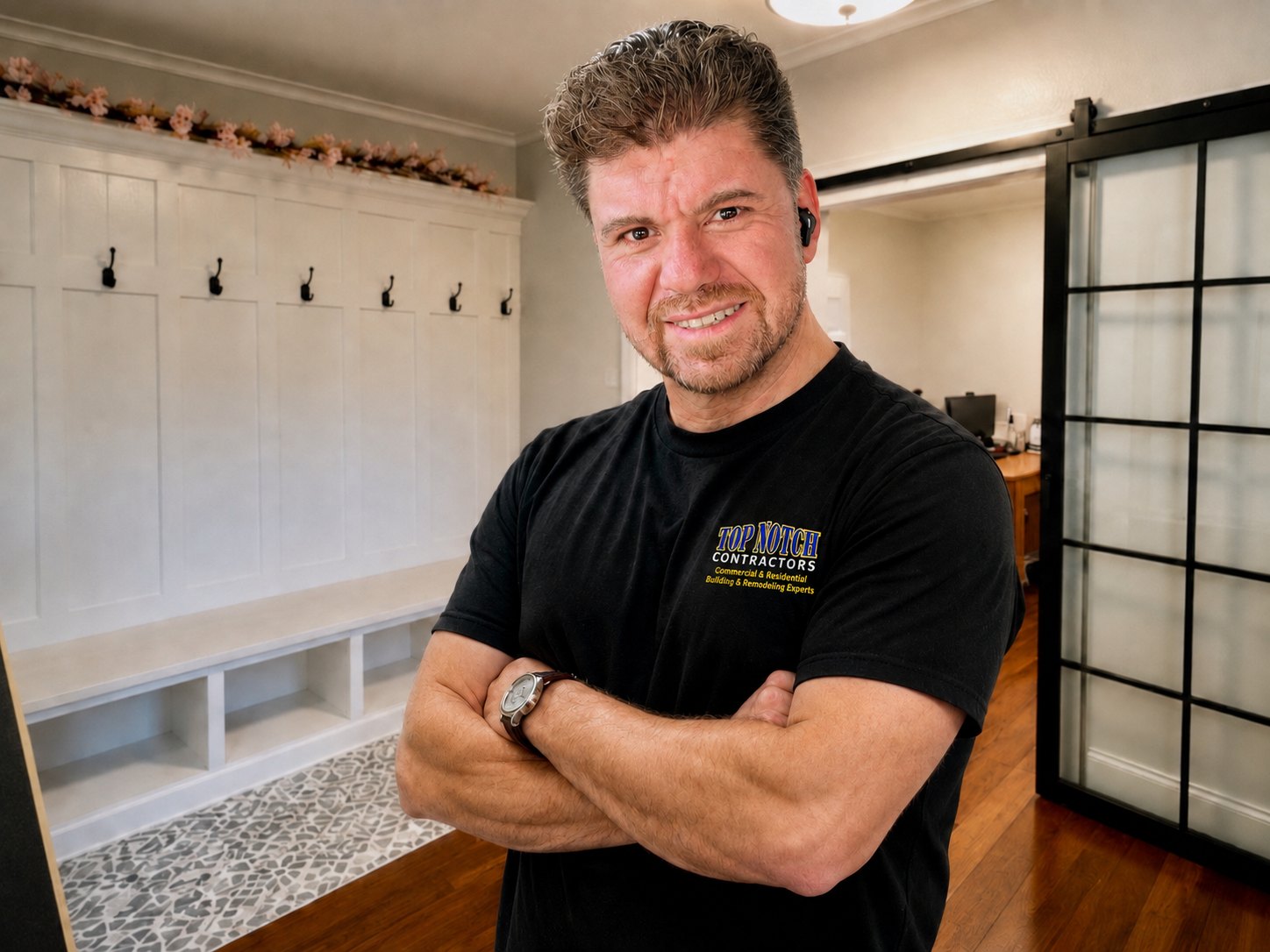Francisco Mena, owner of Top Notch Contractors, in a mudroom his crew built out