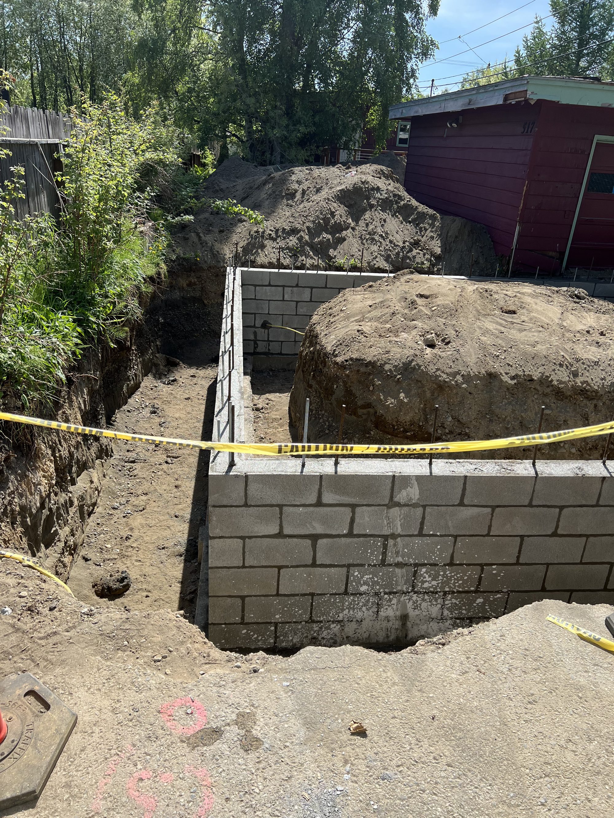 Block foundation wall and excavation for a new detached garage