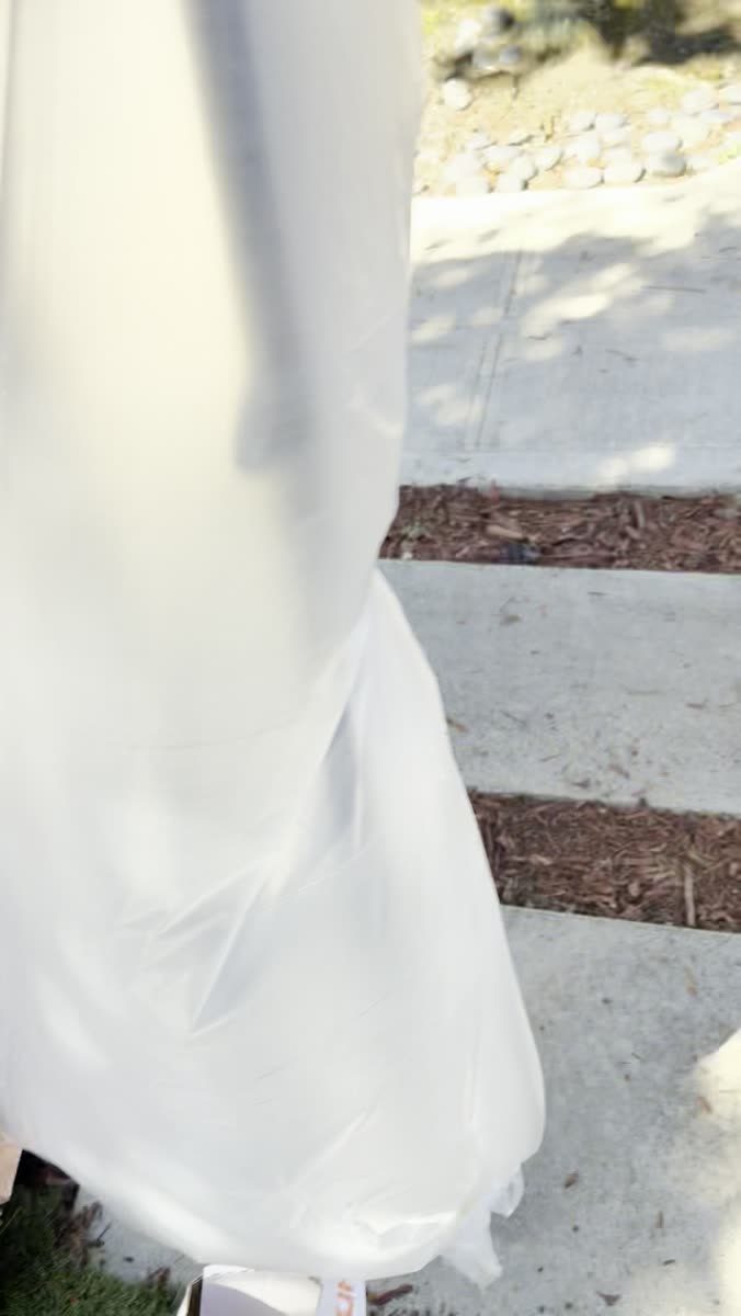 Drop cloth and stain tray set up on the lawn