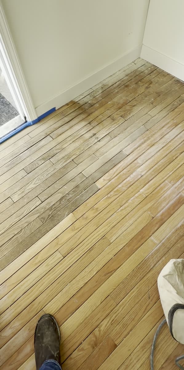 Walkthrough of a hardwood floor part way through refinishing