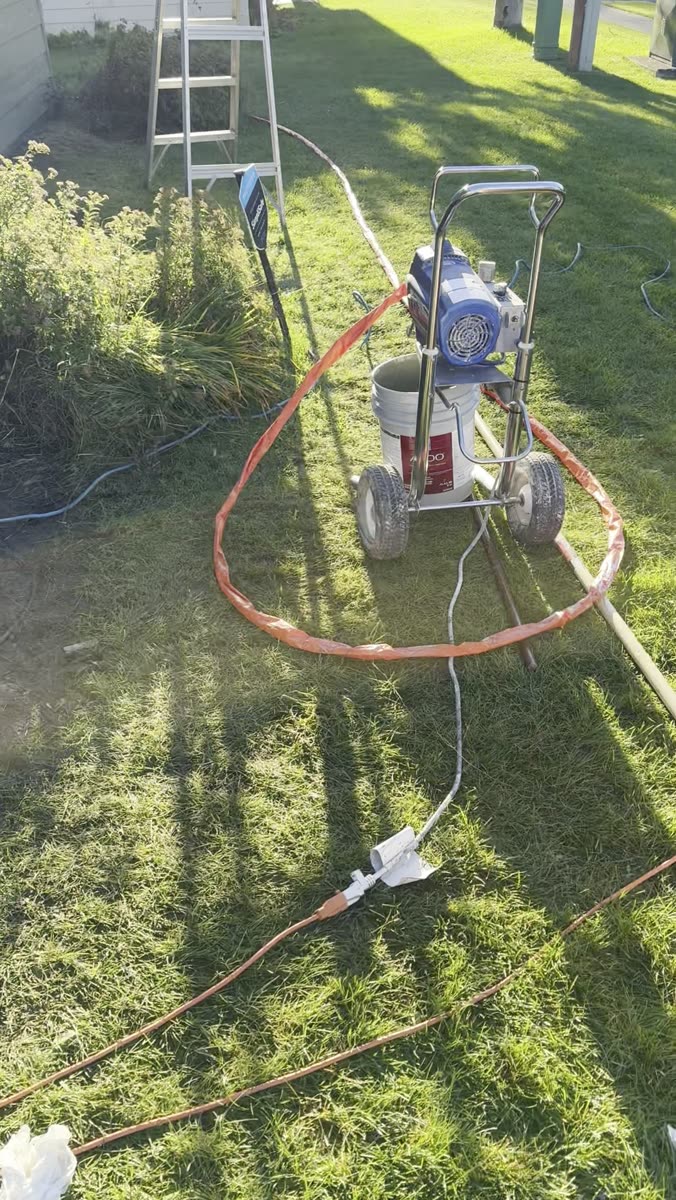 Sheeting and masking in place before exterior painting